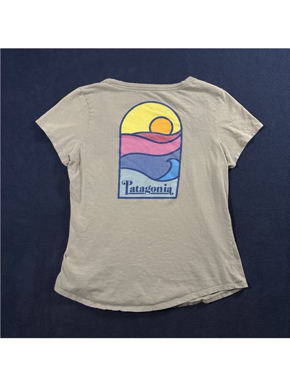 Patagonia Women’s Beige Tee with Yellow Pink and Blue Sunset Graphic